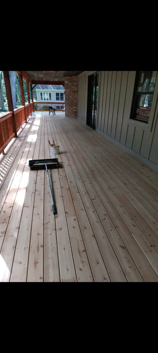 Deck and exterior woodwork restoration highlight.