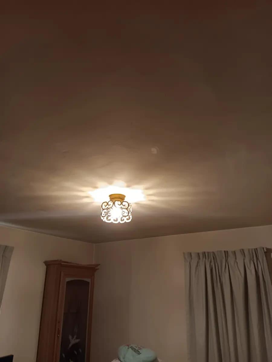 Ceiling trim and crown detail during repainting.