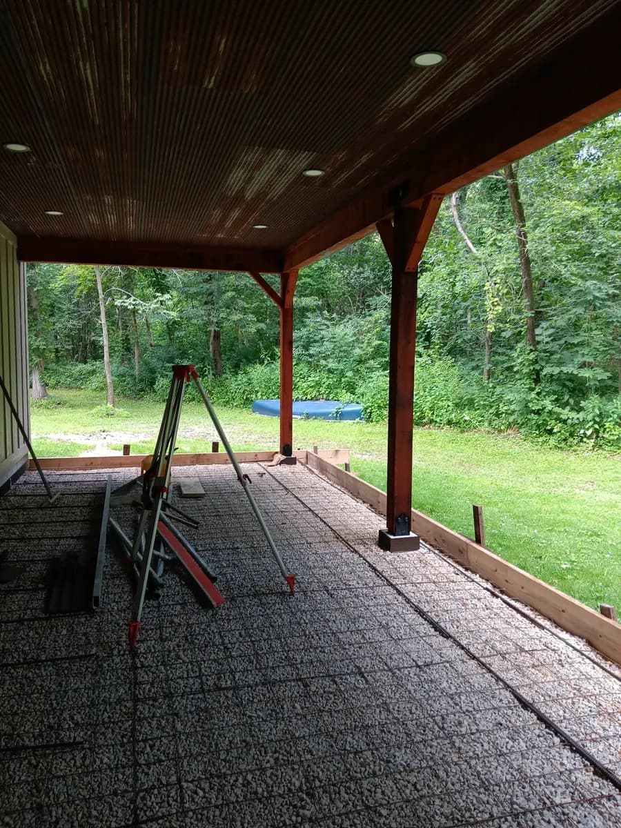 Covered porch before the final wood restoration and stain finish.