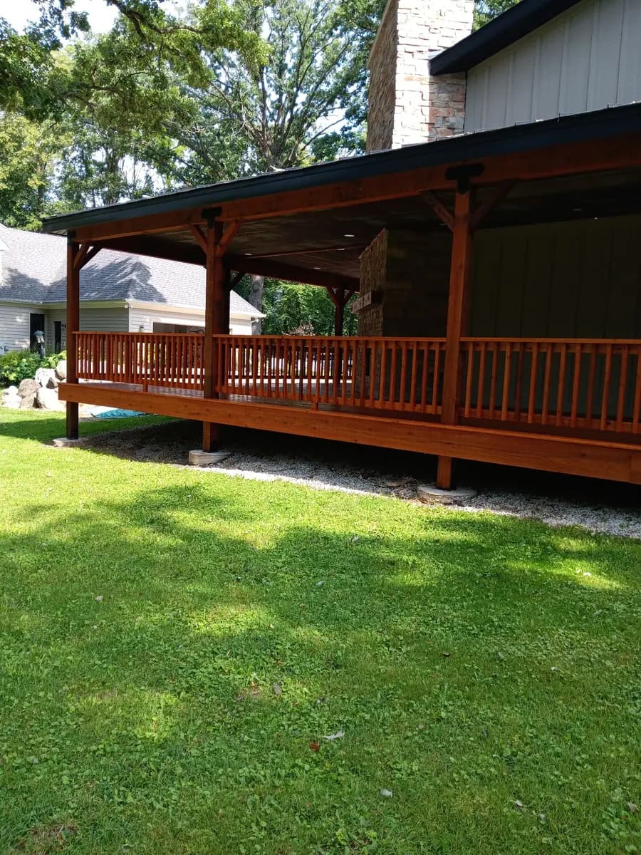 Exterior view of the completed covered porch restoration.