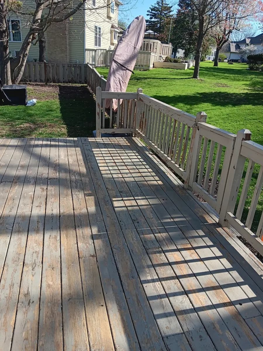 Deck before refinishing with visible surface wear.
