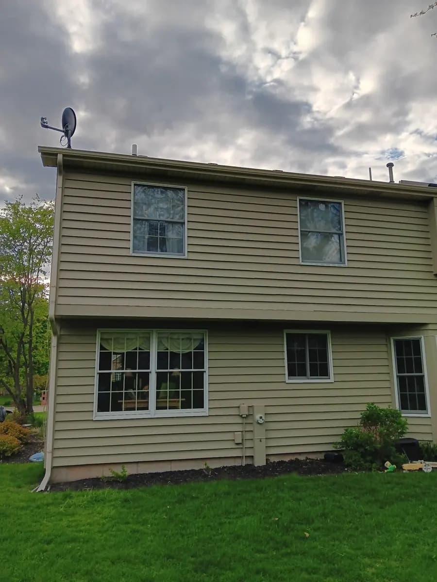 Rear elevation from the two-story siding repaint project.