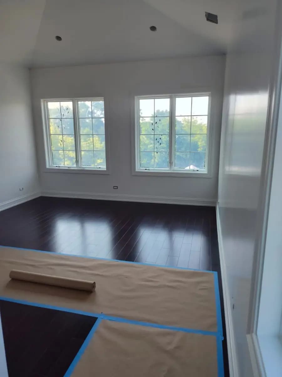 Built-in shelving and room walls after painting.