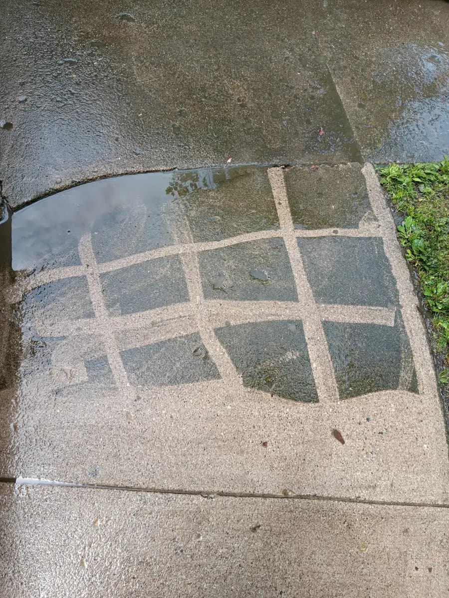 Concrete surface before pressure-washing.